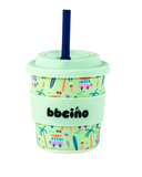 Light green tumbler with colorful patterns and a blue straw on a white background