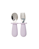 Silver spoon and fork with purple handles on a white background