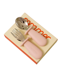 Children's cutlery set with pink handles on a cardboard holder, featuring the brand 'Fammar'.