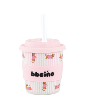 Pink cup with a straw and 'bbeeino' branding on a white background
