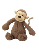 Plush monkey toy on a white background