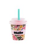 Floral-patterned cup with a pink lid and straw on a white background