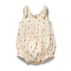 Baby romper with red floral pattern on a white background