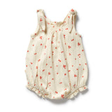 Baby romper with red floral pattern on a white background