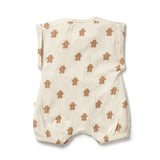 Baby romper with gingerbread man pattern on a white background