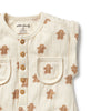Baby onesie with gingerbread man pattern on a white background