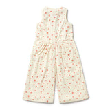 White sleeveless jumpsuit with red floral pattern on a white background