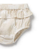 Beige baby bloomers with ruffled details on a white background