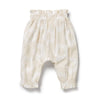 Beige baby pants on a white background