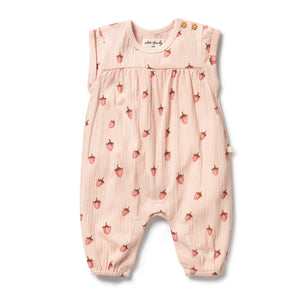Pink baby romper with strawberry pattern on a white background