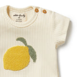 Baby shirt with lemon design and 'wilson + frenchy' branding on a white background