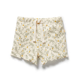 Floral patterned shorts on a white background