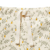 Floral-patterned fabric with a white drawstring on a white background