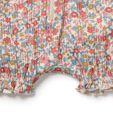 Floral patterned fabric with a white background
