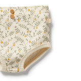 Floral-patterned baby bloomers with buttons on a white background