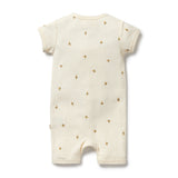 Baby romper with floral pattern on a white background