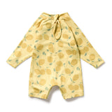 Yellow baby romper with lemon pattern on a white background