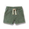 Green shorts with a drawstring on a white background