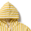 Yellow and white striped hooded garment on a white background