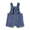 Blue baby romper with bow straps on a white background