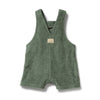 Green baby romper with a small patch on a white background