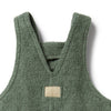 Green textured vest with a brand label on a white background