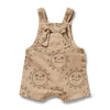 Beige baby romper with sun pattern on a white background