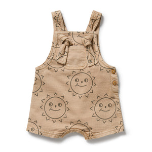 Beige baby romper with sun pattern on a white background