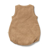 Brown knitted baby romper with textured back on a white background