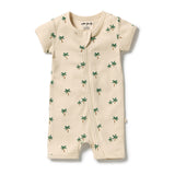 A cream-colored ribbed short-sleeve baby romper with an all-over green palm tree print, shown flat on a white background.