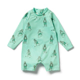 A mint green long-sleeve baby romper with an all-over print of cartoon bears playing soccer, shown flat on a white background.
