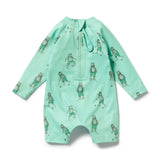 A mint green baby romper with a long zipper at the neck and an all-over print of cartoon frogs in matching green outfits, displayed flat on a white background.