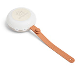 Small white frying pan with a brown handle on a white background