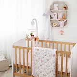 Nursery room with wooden crib and decorative items