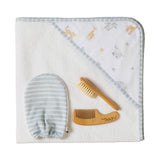 Baby care items including a hooded towel, mitt, brush, and comb on a white background.