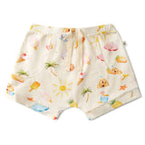 Beige shorts with beach-themed pattern on a white background
