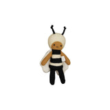 Toy bee with a white body and black stripes on a white background