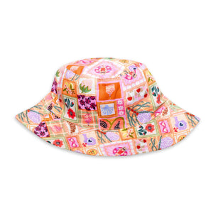 Colorful bucket hat with patchwork design on a white background