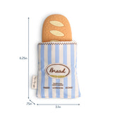 Toy bread with a striped bag labeled 'Bread' on a white background