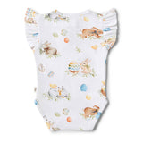 Baby onesie with Easter-themed design on a white background