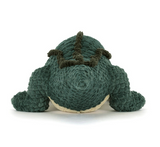 Knitted green dinosaur toy on a white background