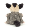 Plush toy possum on a white background