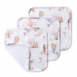 Set of three baby bibs with fairy tale design on a white background