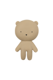 A minimalist beige teddy bear figurine with small black eyes and nose, standing against a solid white background.