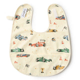 Baby bib with race car pattern on a white background