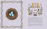 A flat-lay photograph of a children's book spread showing a nature-themed page. The left page features an illustration of a brown bird's nest with three light blue eggs, framed by a green leafy border.