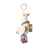 Plush toy duck with colorful elements on a white background