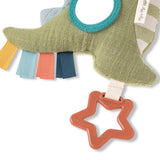 Textured green baby comfort blanket with colorful tassels and a star-shaped rattle on a white background
