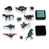 Set of dinosaur-shaped stamps with ink pads on a white background