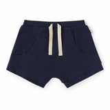 Snuggle Hunny Moonlight organic cotton toddler shorts in deep blue, Size 1, featuring a ribbed fabric and elasticated waistband.